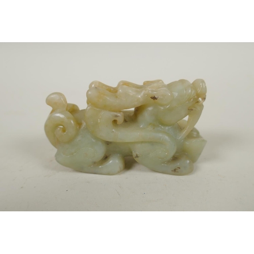 253 - A Chinese carved celadon jade kylin, 8cm