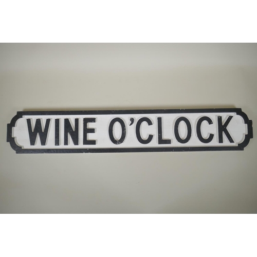 254 - A painted wood 'Wine O'Clock' road sign, 14 x 78cm