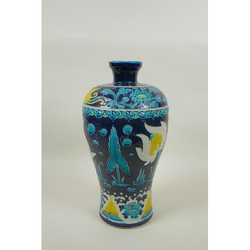 255 - A Chinese fahua Meiping porcelain vase with lotus pond and phoenix decoration, 30cm high