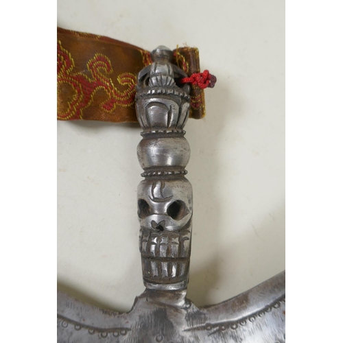 261 - A Tibetan ceremonial white metal Kartika with skull decoration to handle, 17cm