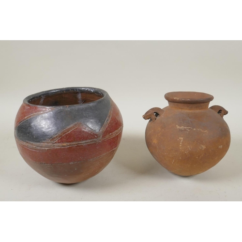 264 - An African clay beer pot, and an antique Continental two handled terracotta pot, 2cm high