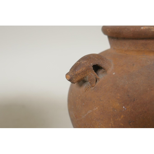 264 - An African clay beer pot, and an antique Continental two handled terracotta pot, 2cm high