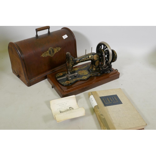 27 - A Singer 12K Family sewing machine with wood case, and the Singer sewing book, Mary Brooks Picken, p... 