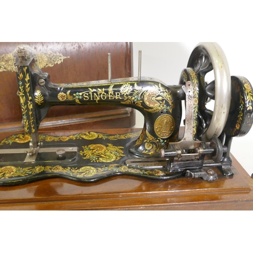 27 - A Singer 12K Family sewing machine with wood case, and the Singer sewing book, Mary Brooks Picken, p... 