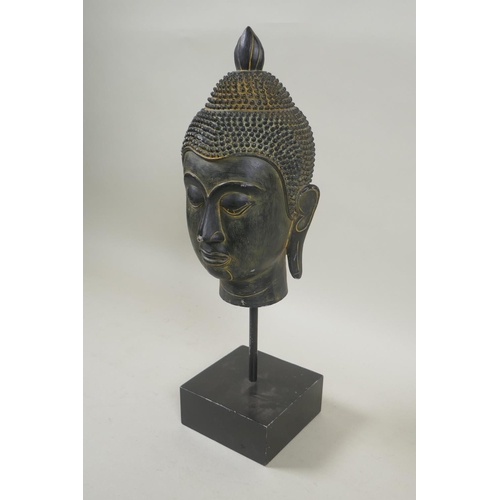 271 - A composition Buddha head, 35cm high