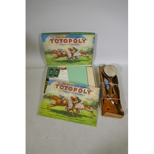 289 - A Waddington's Totopoly race game and antique table tennis set