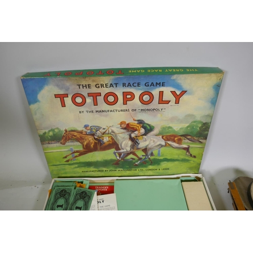 289 - A Waddington's Totopoly race game and antique table tennis set