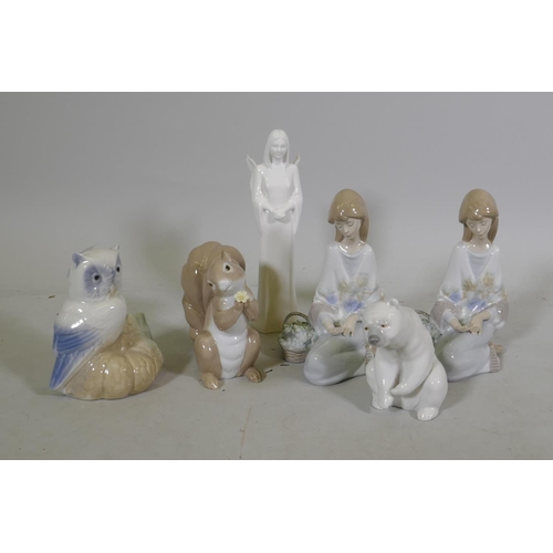 295 - Lladro figures, polar bear and squirrel, and two of a young girl with flowers, and a Coalport Guardi... 