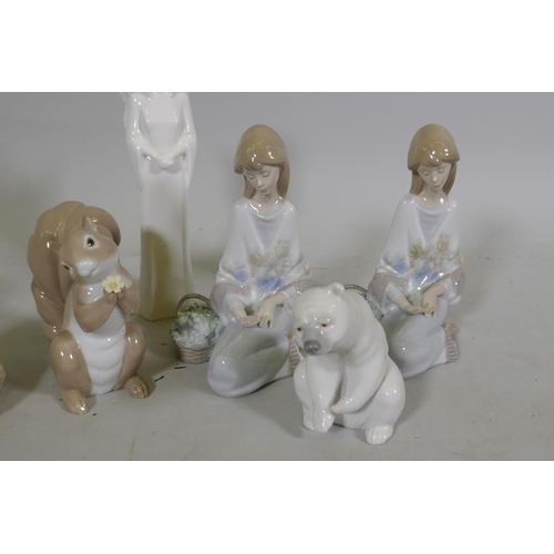 295 - Lladro figures, polar bear and squirrel, and two of a young girl with flowers, and a Coalport Guardi... 