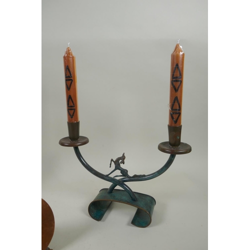 299 - A studio art copper and brass hand assembled candlestick, a bronze two branch candlestick with deer ... 