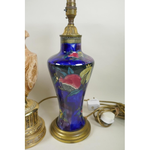 307 - A Rubens ware pomegranate vase converted to a table lamp, another ceramic vase table lamp, a lilac g... 