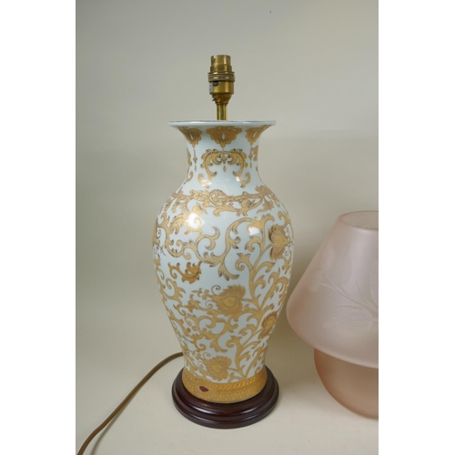 307 - A Rubens ware pomegranate vase converted to a table lamp, another ceramic vase table lamp, a lilac g... 