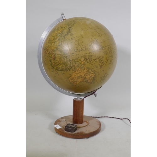 32 - An illuminated terrestrial globe with glass body, AF, 53cm high