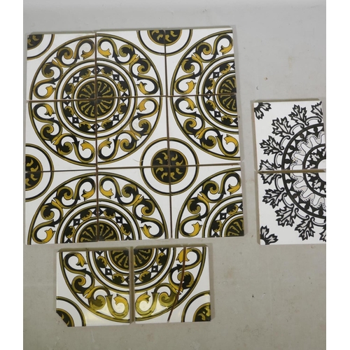 329 - Eleven Spanish terracotta tiles with a black and gold repeating pattern, (two AF), and two other til... 