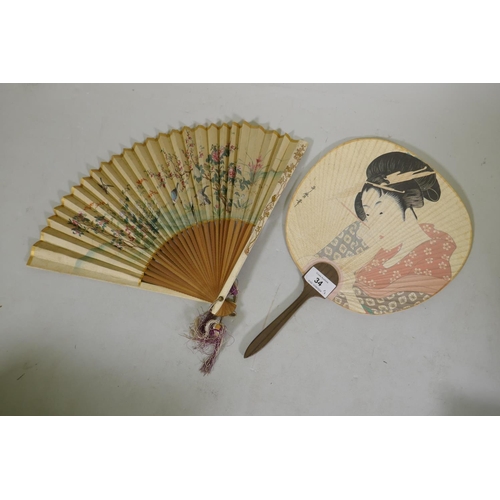 34 - A Japanese silk on paper fan, decorated with a view of Mt Fuji, birds and blossoms, 27cm long, and a... 