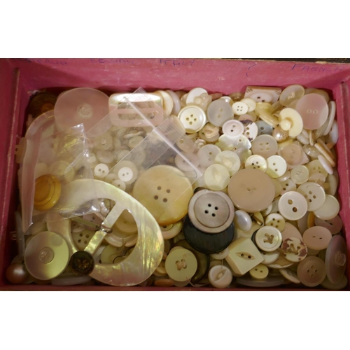 49 - A quantity of mother or pearl buttons, fish gaming counters and 'spellicons' sticks 