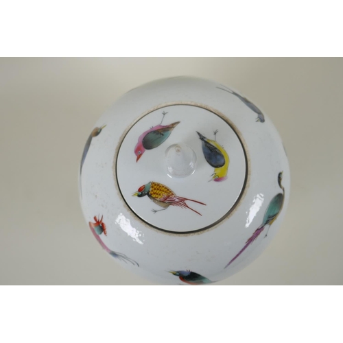 58 - A Chinese polychrome porcelain jar and cover with allover bird decoration, GuangXu 6 character mark ... 