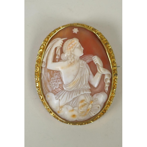 602 - An antique hand carved shell cameo of Asteria in a yellow metal mount, 5.5 x 7cm