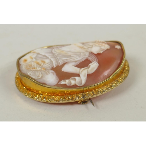 602 - An antique hand carved shell cameo of Asteria in a yellow metal mount, 5.5 x 7cm