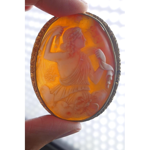 602 - An antique hand carved shell cameo of Asteria in a yellow metal mount, 5.5 x 7cm