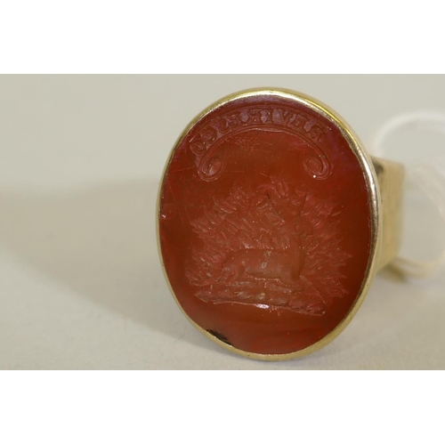 605 - A gold intaglio ring, possibly Scottish, marked 9ct, set with carnelian and carved with the Maxwell ... 