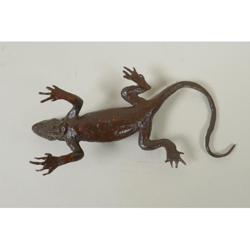 61 - A Japanese style bronze okimono lizard, 14cm long