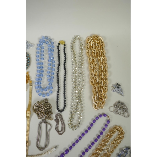 615 - A quantity of costume jewellery to include pocket watches, wrist watches, chains, watch movements, b... 