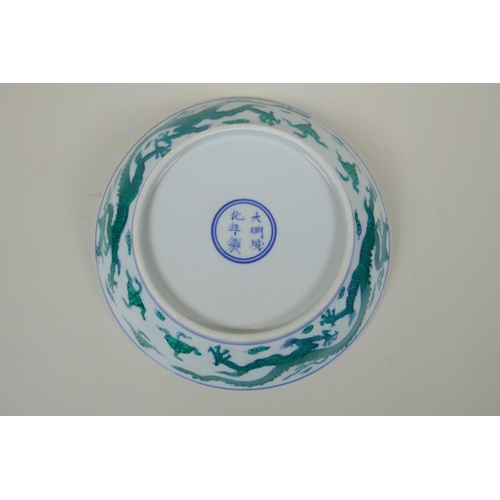 63 - A Chinese blue and white porcelain dish decorated with green enamelled dragons, Chenghua 6 character... 