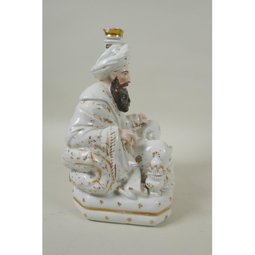 66 - A pair of French porcelain scent bottles modelled as a seated Sultan and Sultana, in the manner of J... 