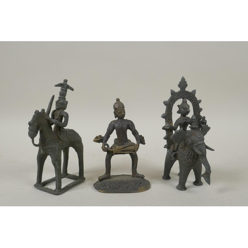 70 - Three antique Indian bronze figures, two riding on a horse and elephant, 13cm high