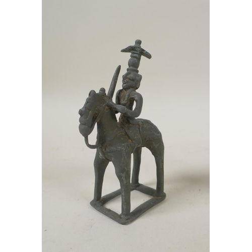 70 - Three antique Indian bronze figures, two riding on a horse and elephant, 13cm high