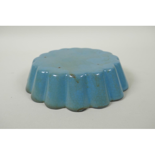 73 - A Chinese celadon crackle glazed porcelain petal shaped dish, 16cm diameter