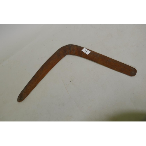 74 - An antique hardwood boomerang, 52cm wide