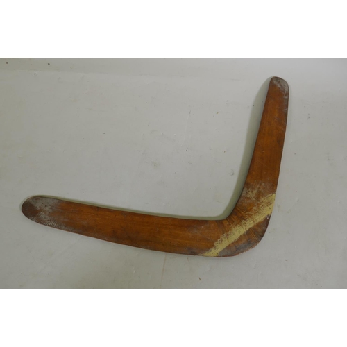 74 - An antique hardwood boomerang, 52cm wide