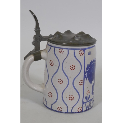 76 - A German ceramic Stein with pewter lid, designed by Ludwig Holwein, No. 65 from a set of 12 decorate... 