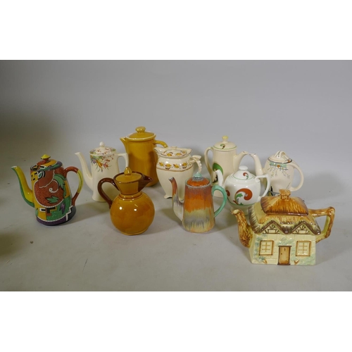 79 - A collection of Staffordshire pottery tea and coffee pots, various makes, Doulton 'Lynn', Royal Wint... 