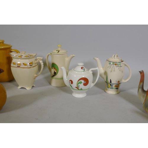 79 - A collection of Staffordshire pottery tea and coffee pots, various makes, Doulton 'Lynn', Royal Wint... 