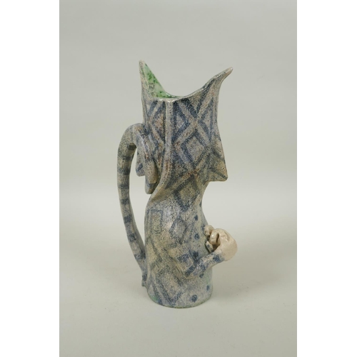 8 - An Amanda Popham (b. 1954) studio pottery figural jug/vase, signed and dated 2014, 25cm high