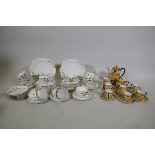 82 - A vintage Bohemian 12 place porcelain tea set with floral decoration, sandwich plate 23cm diameter, ... 