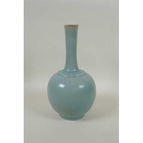 83 - A Chinese ru ware style porcelain bottle vase, 26cm high