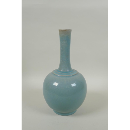 83 - A Chinese ru ware style porcelain bottle vase, 26cm high