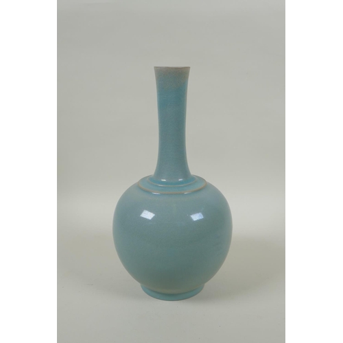 83 - A Chinese ru ware style porcelain bottle vase, 26cm high