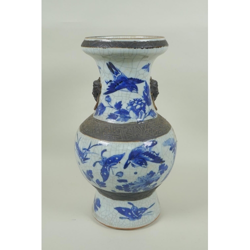 85 - A C19th Chinese blue and white crackle glazed vase with bronze style bands and decorated with birds ... 