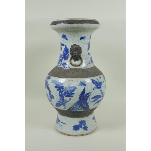 85 - A C19th Chinese blue and white crackle glazed vase with bronze style bands and decorated with birds ... 