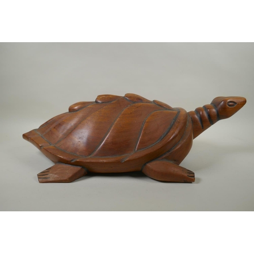 86 - A Pacific islanders carved hardwood figure of a turtle, 60cm long