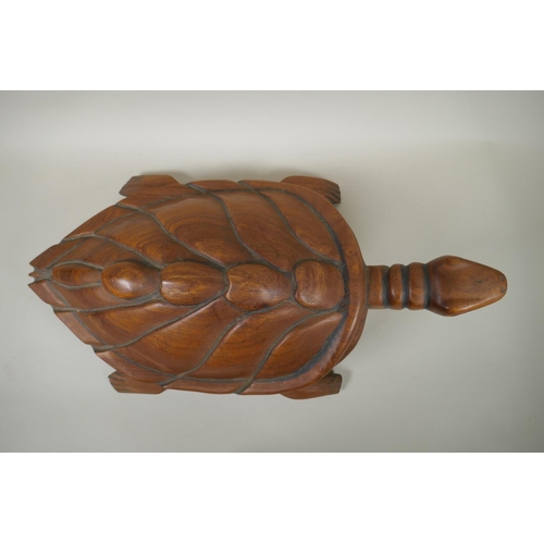 86 - A Pacific islanders carved hardwood figure of a turtle, 60cm long