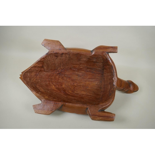 86 - A Pacific islanders carved hardwood figure of a turtle, 60cm long