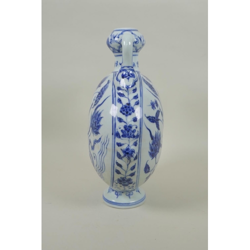 91 - A Chinese blue and white two handled moon flask with lotus flower decoration, 28cm high