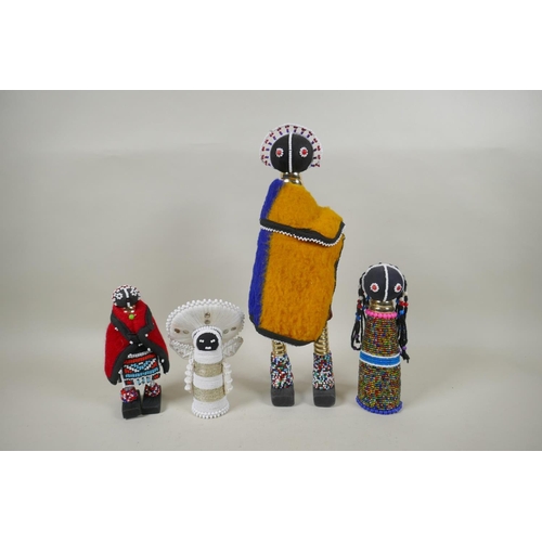 92 - Four South African Ndebele beadwork dolls, largest 37cm high