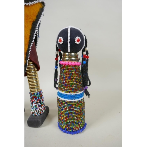 92 - Four South African Ndebele beadwork dolls, largest 37cm high